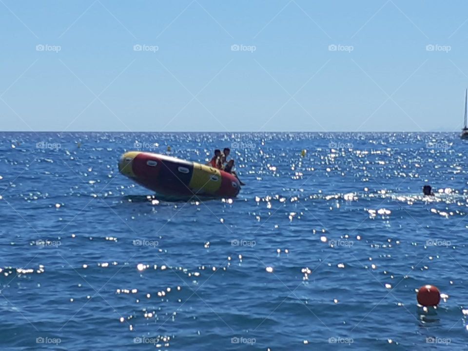 Buoy towed by a boat