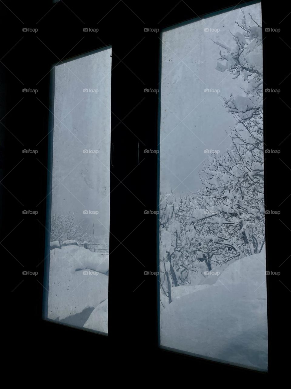 Snowfall through window 