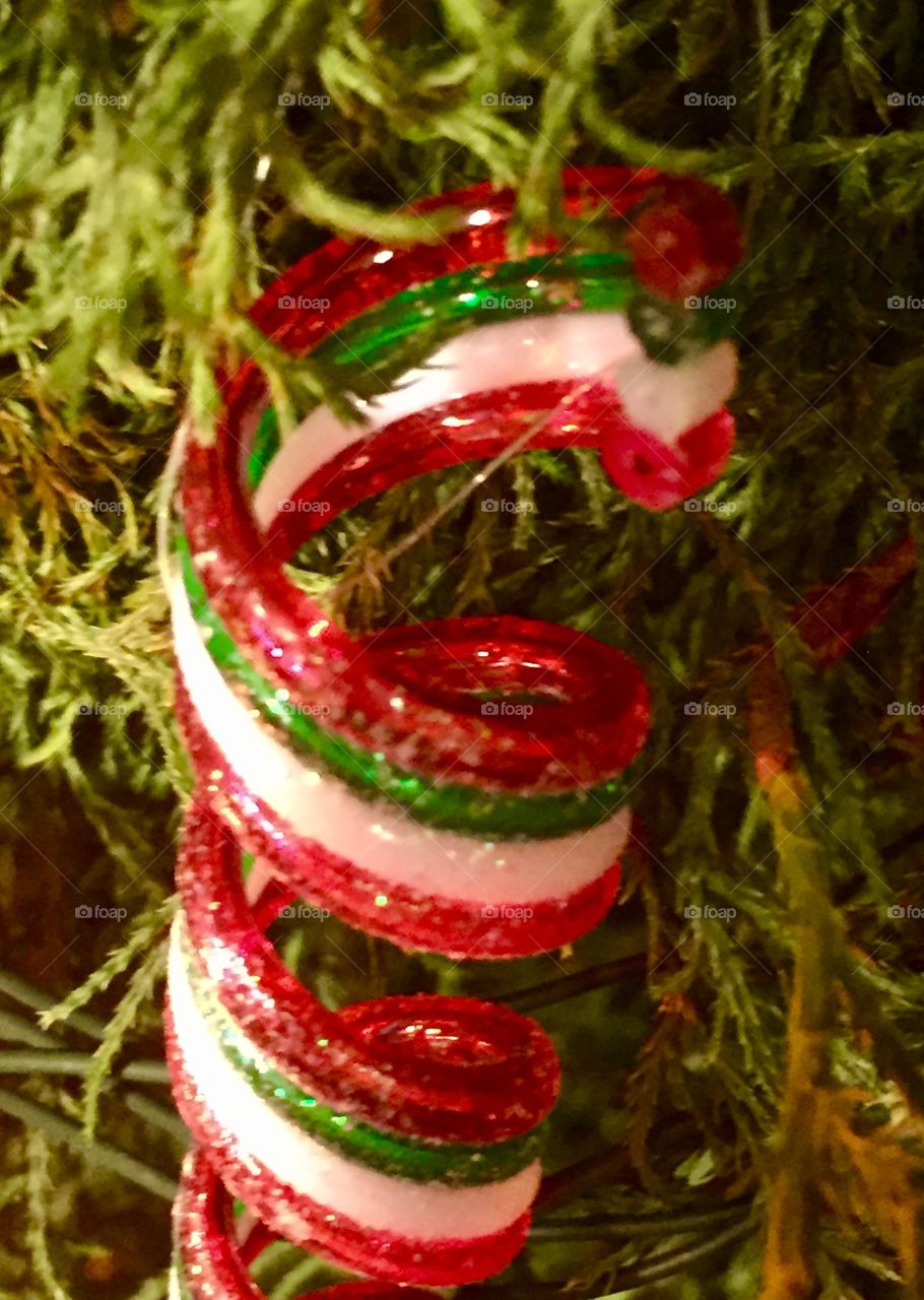 Detailed Christmas ornament hanging from tree