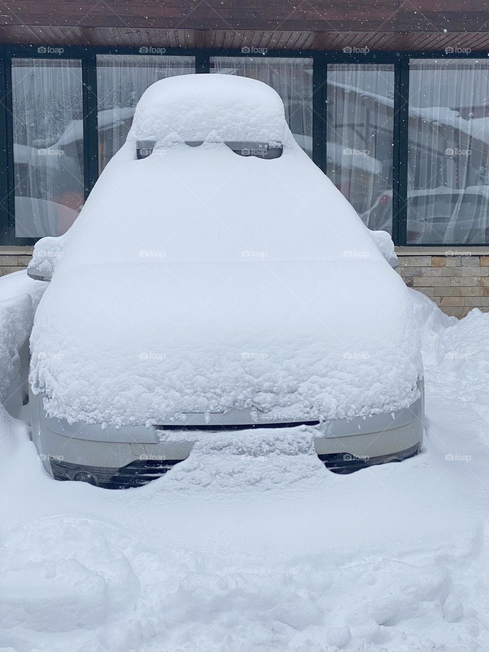 Car covered with snow 