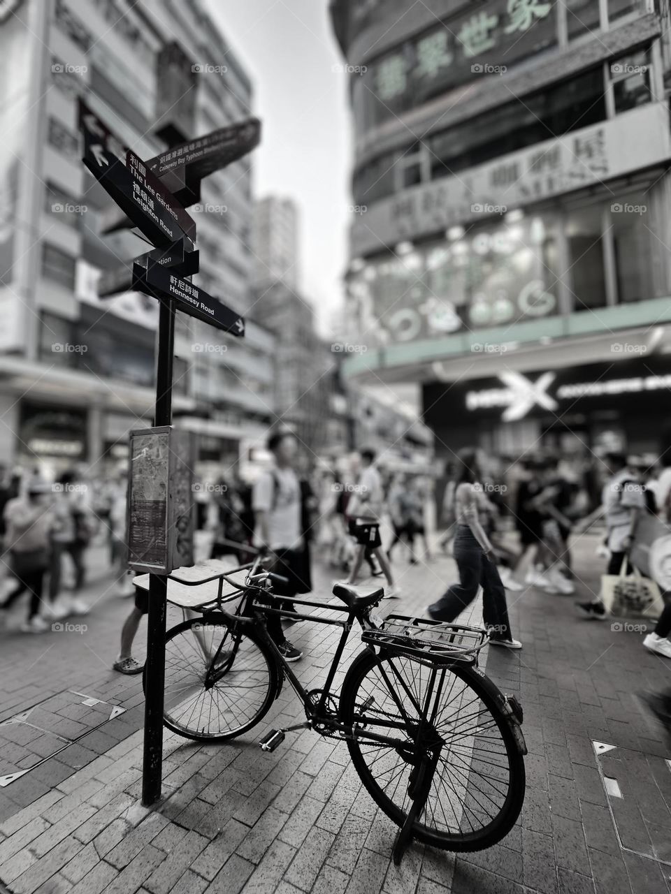 One lonely bicycle in the busy street of Hong Kong