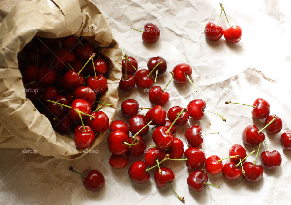 Cherries in a paper bag