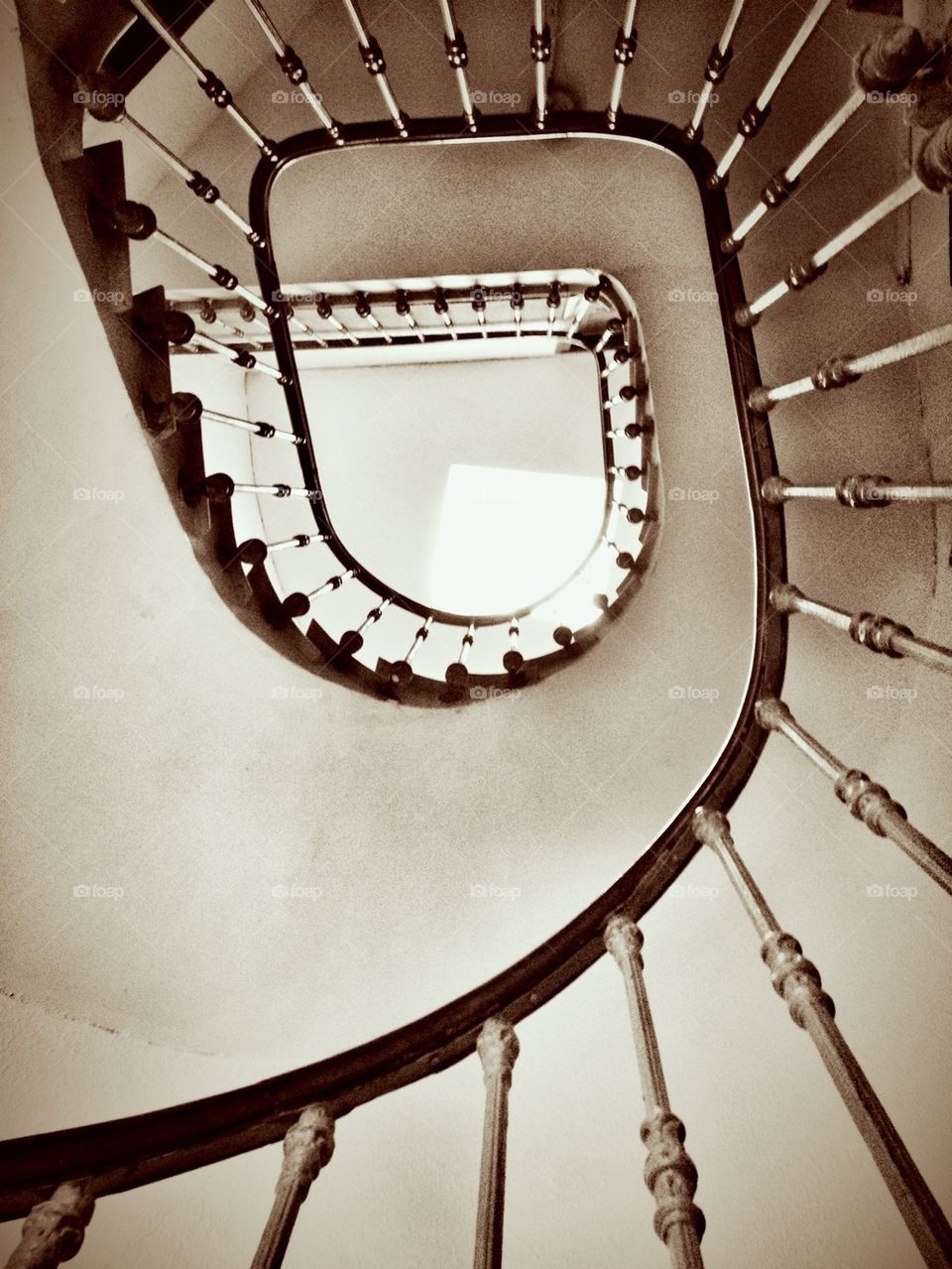 Old gorgeous stairs in abandoned building, France.