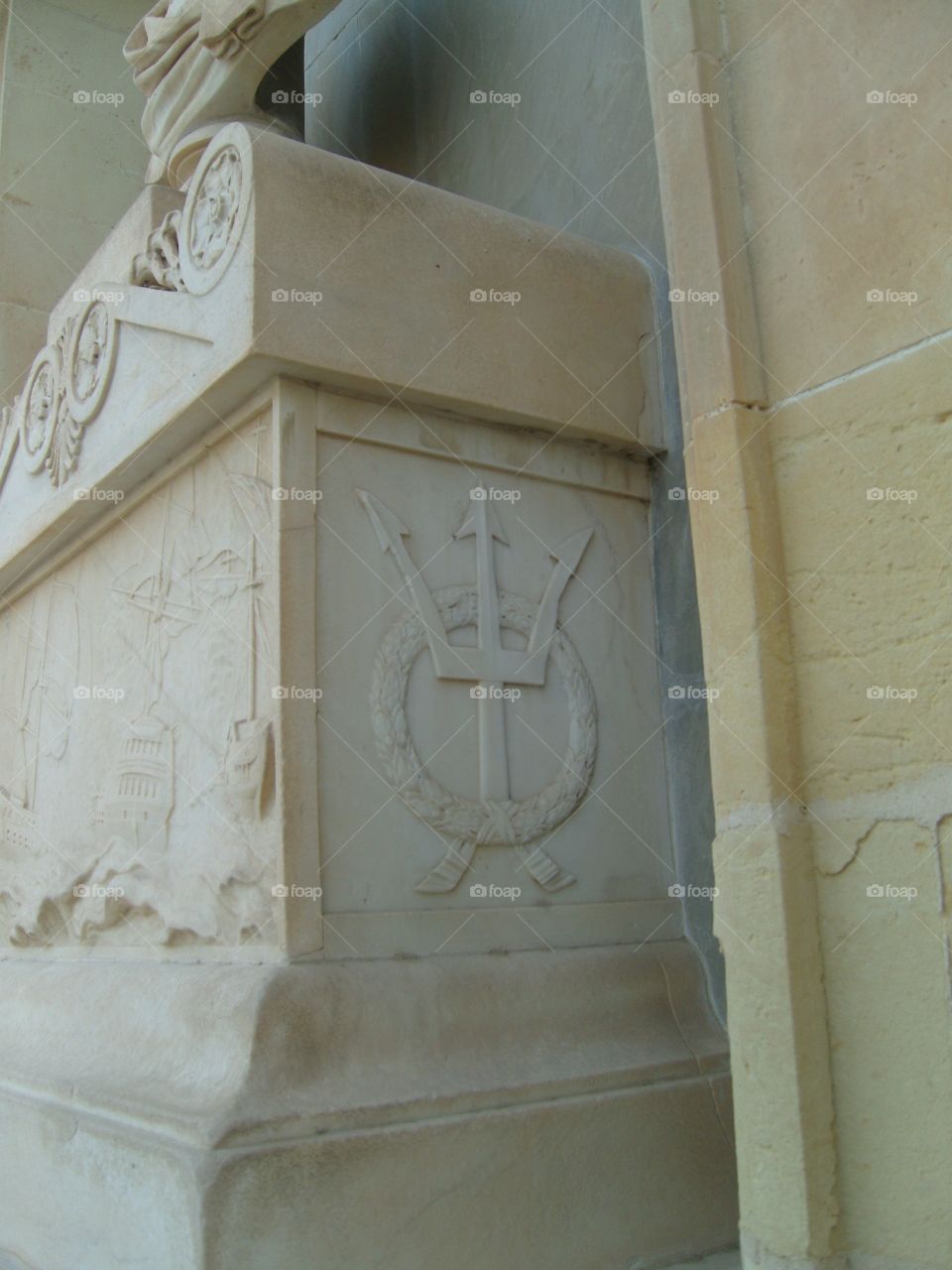 Malta trident with wreath symbol on monument
