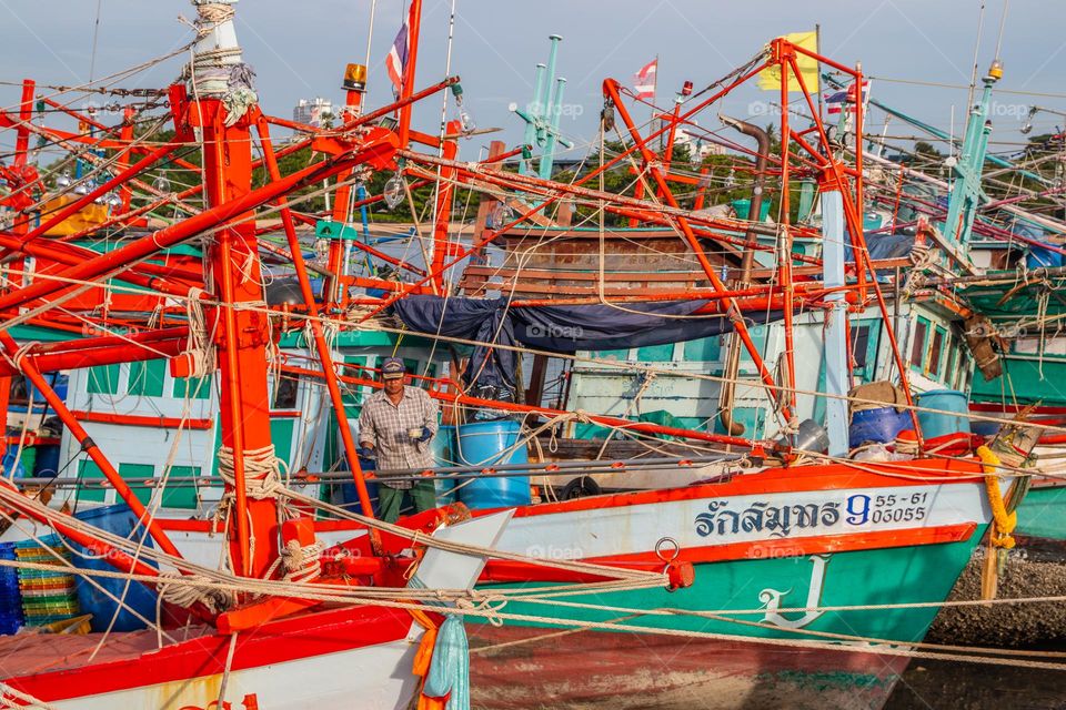 Thai Fisherman's boats at a fishing Pier in Thailand Southeast Asia