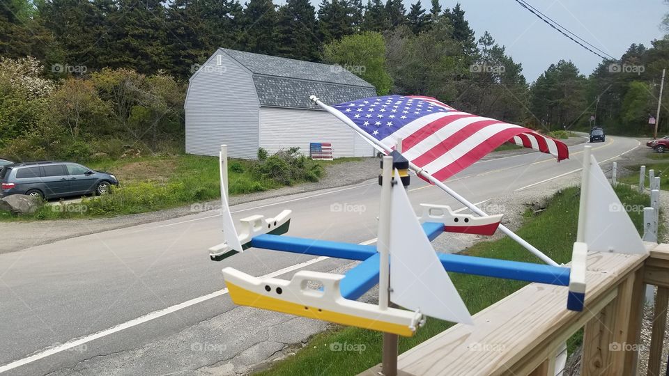 Patriotic wooden lobsterboat weathervane