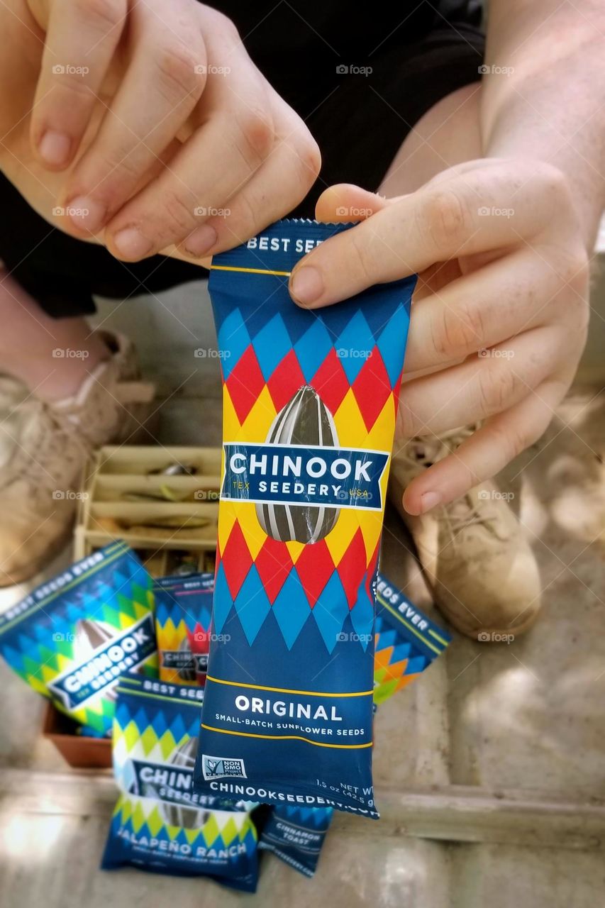 Hands Holding Chinook Seeds