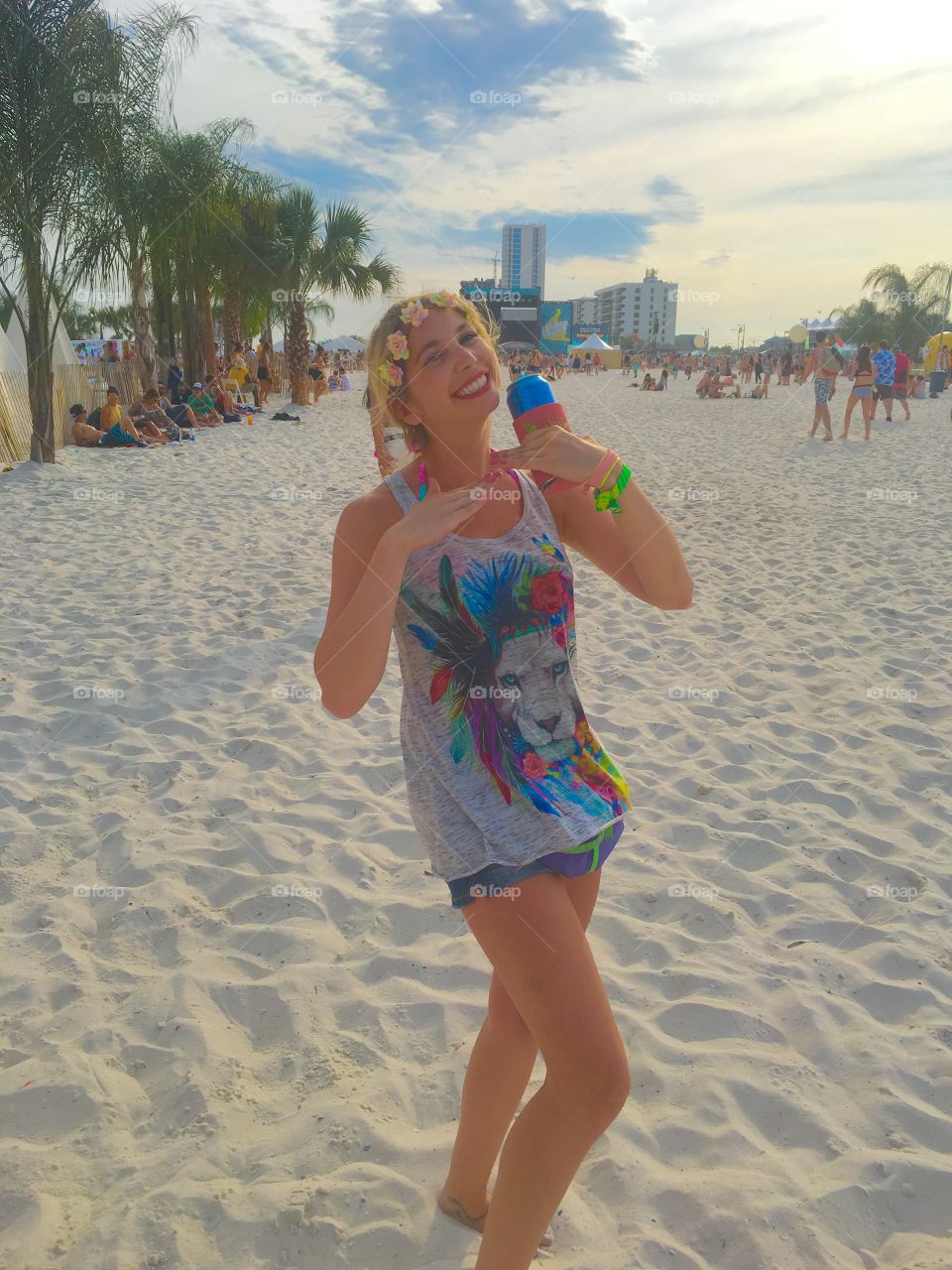 Happy woman posing on beach