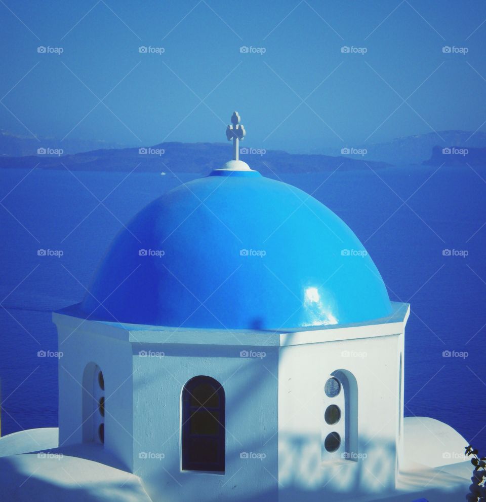 Blue domed church in santorini
