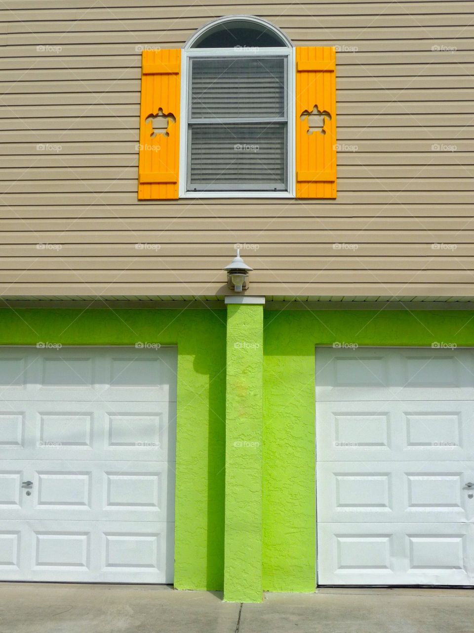 Window and house in sunny colors