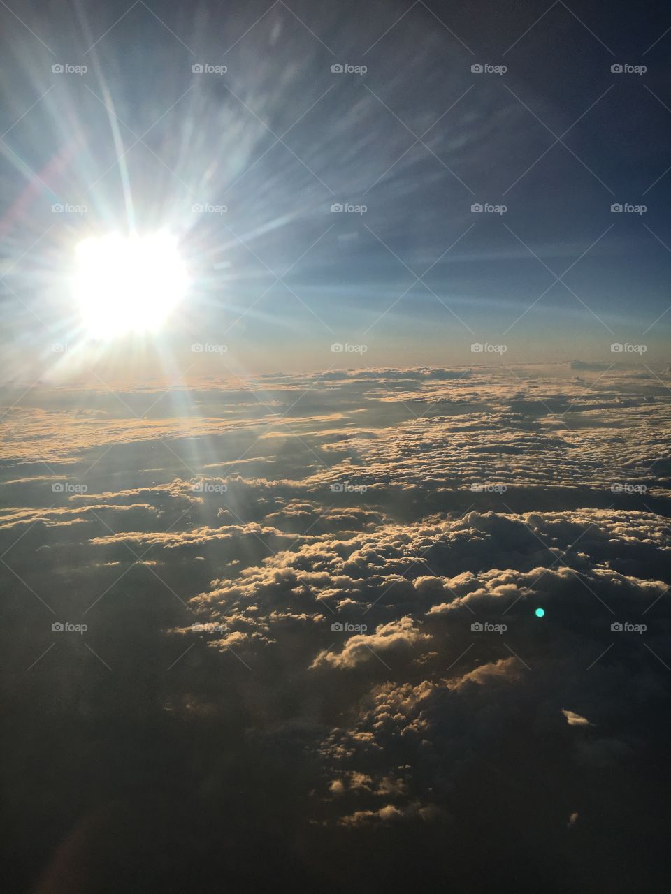Nothing but puffy clouds and sunny skies from 30,000 feet.