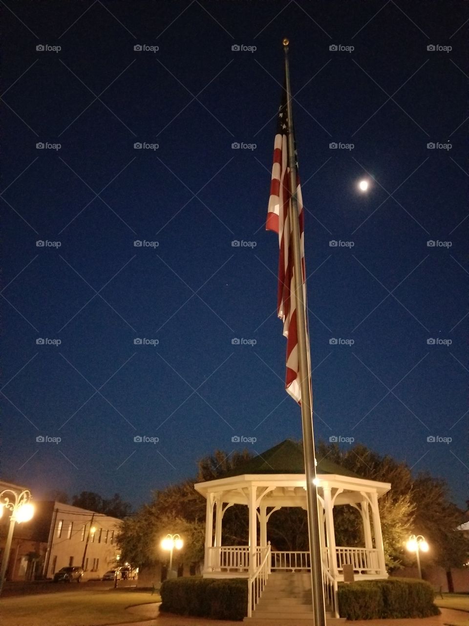 Gazebo with American Flag and Shining Moon in Downtown Jefferson Texas 
