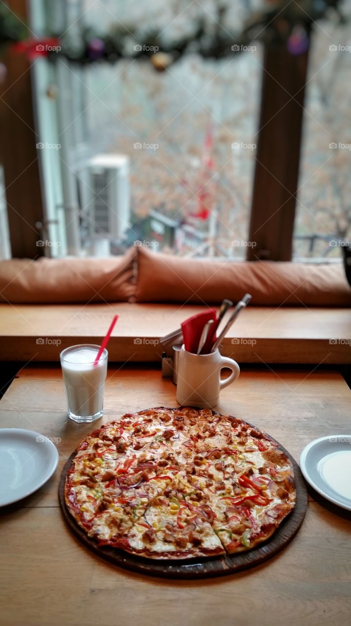 pizza diner in a restaurant