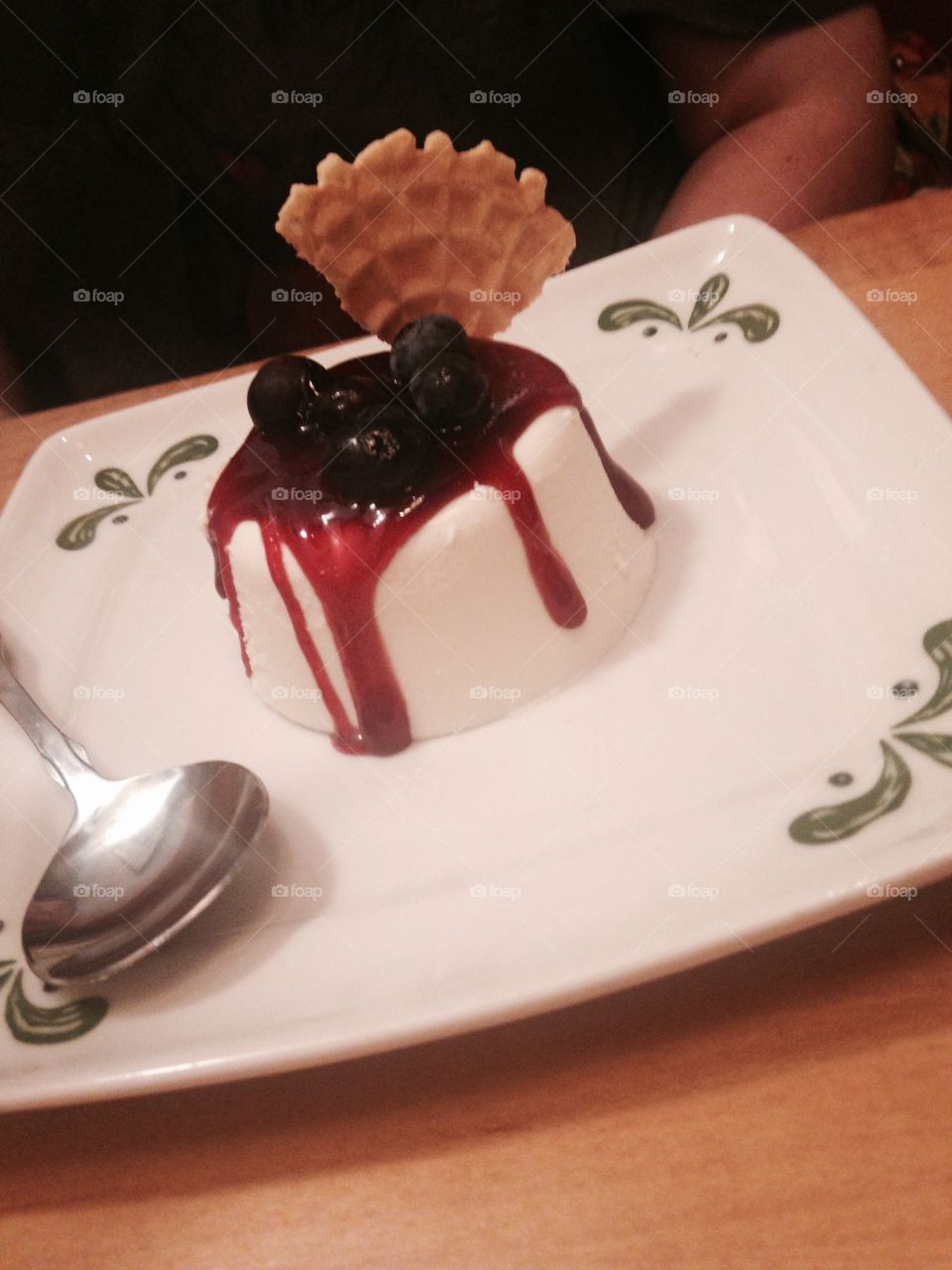 I snapped a photo of a delicious tart my cousin had gotten at Olive Garden. Patterned plate and lovely delicate food with waffle on top. 