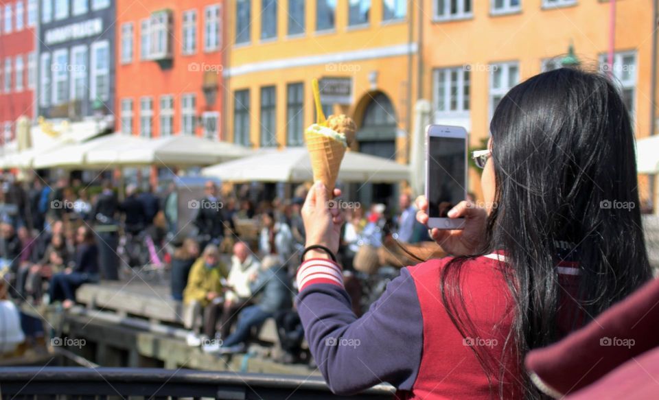 Ice-cream time in summer in the city