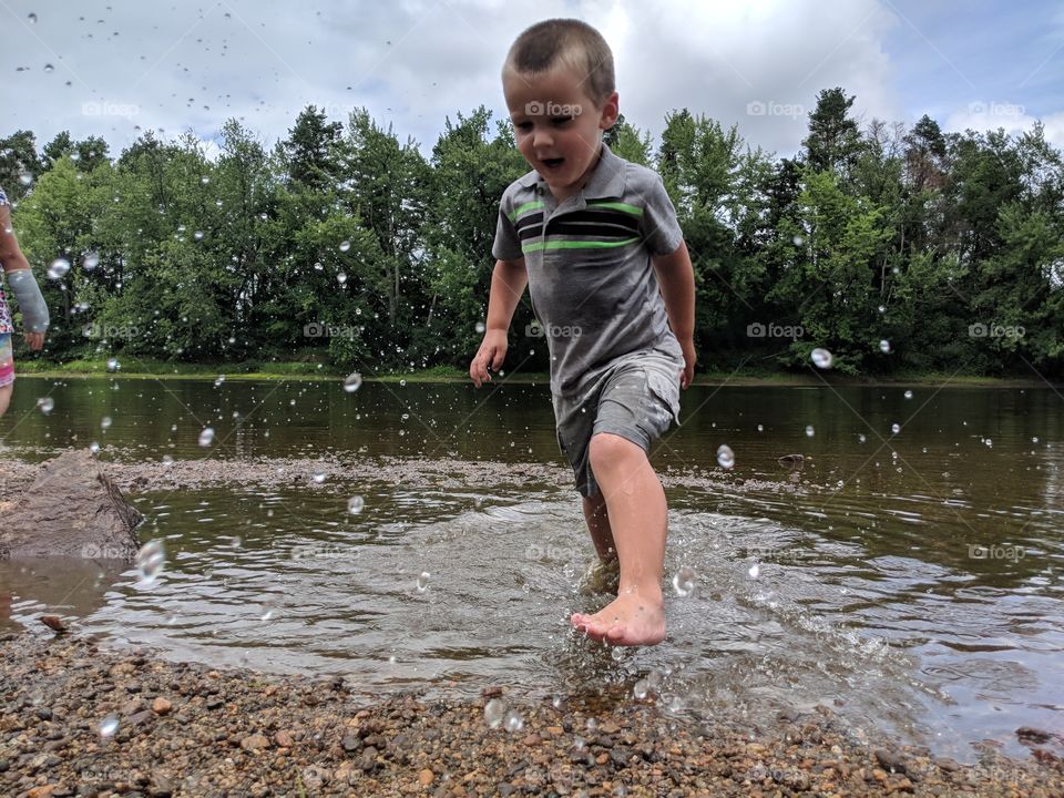 splashing in the river water