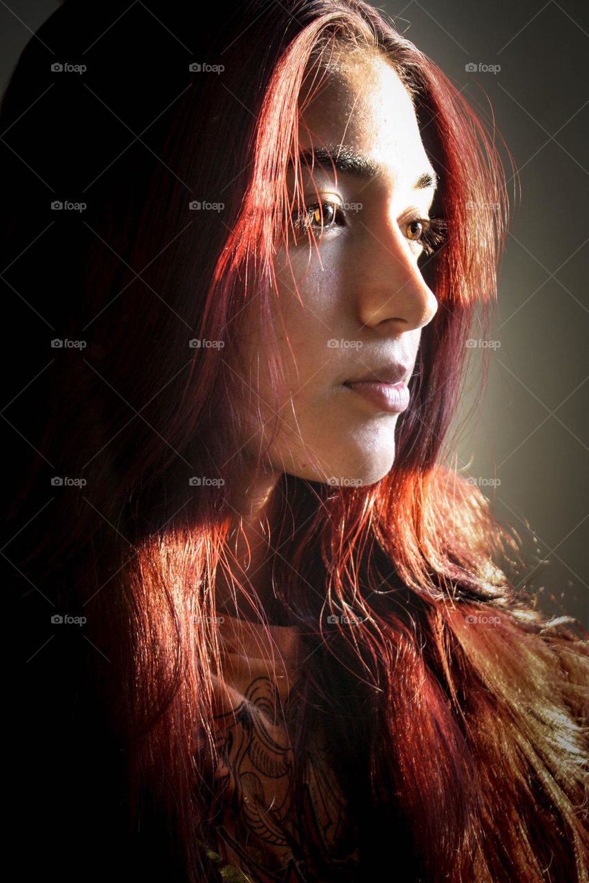 Beautiful young woman with gorgeous hair