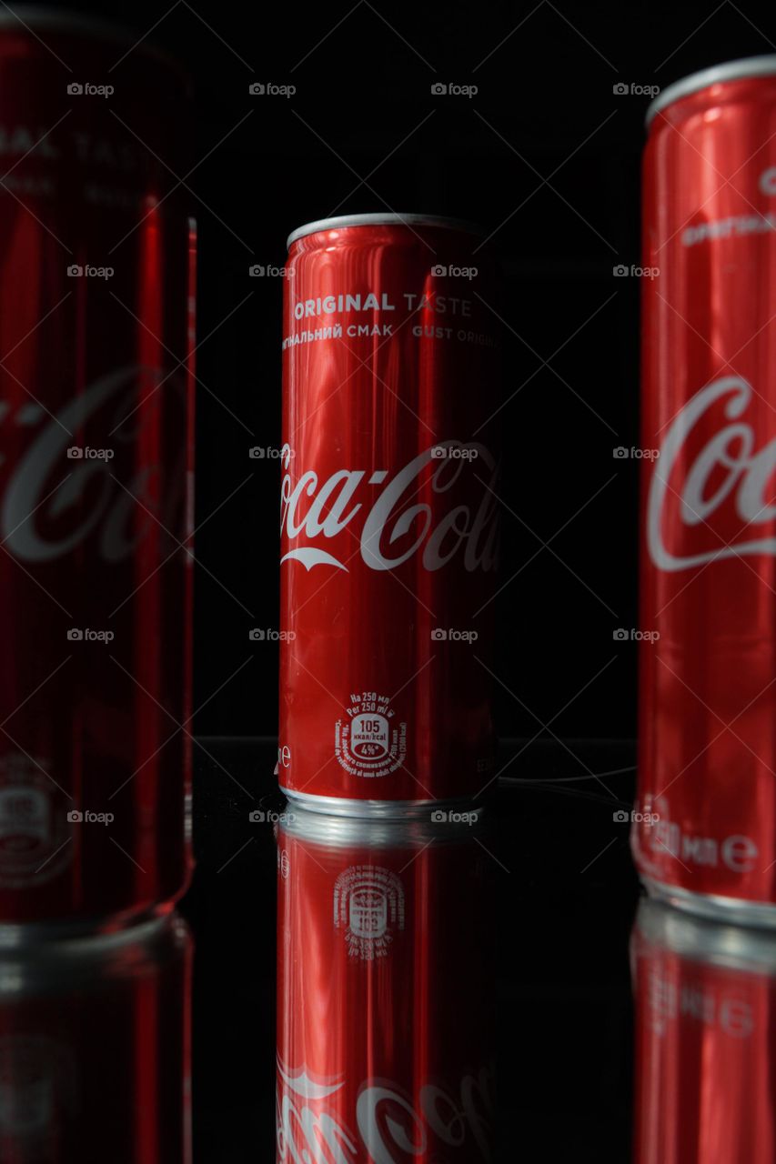 Three coke cans
