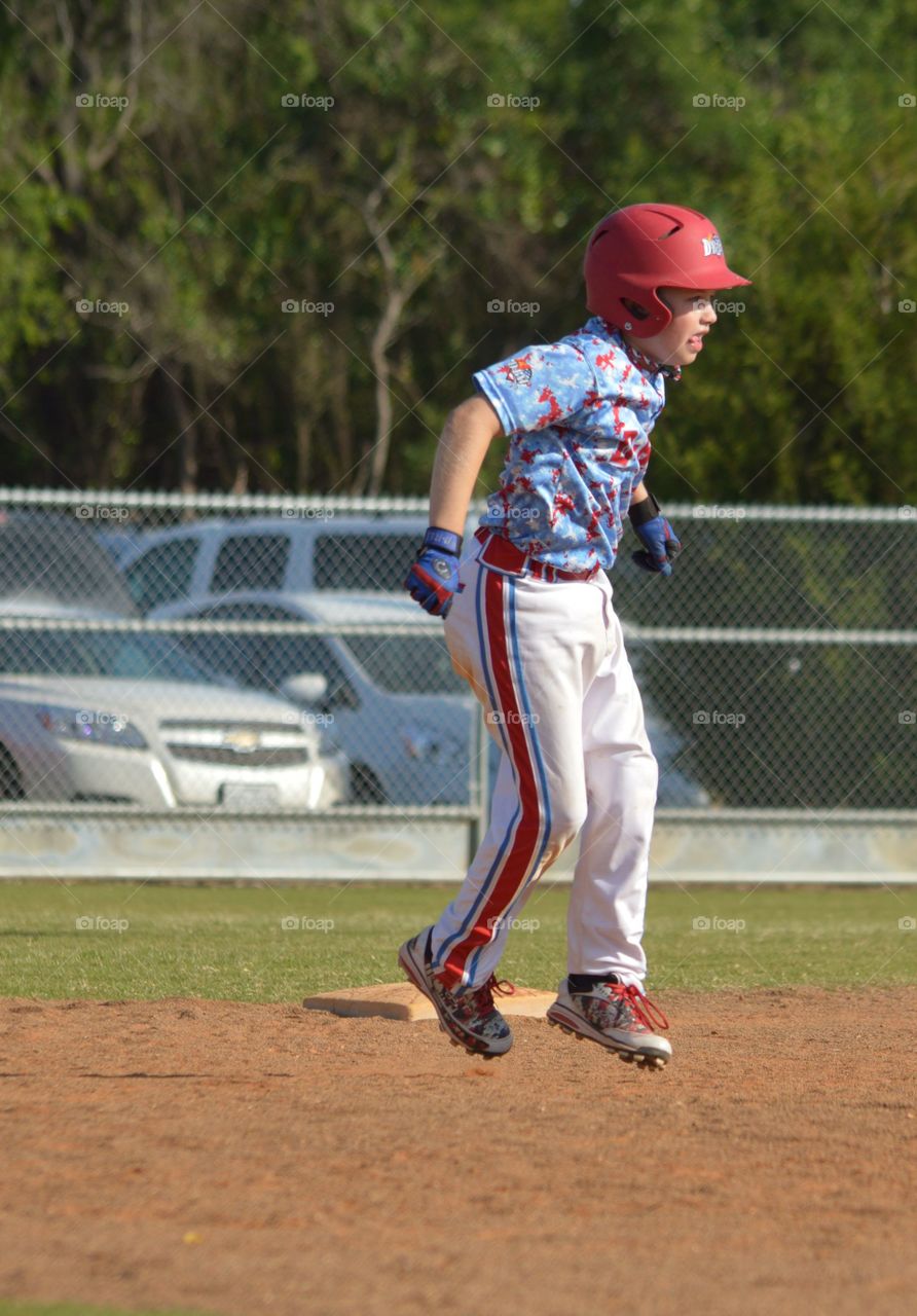 Baseball player playing in ground