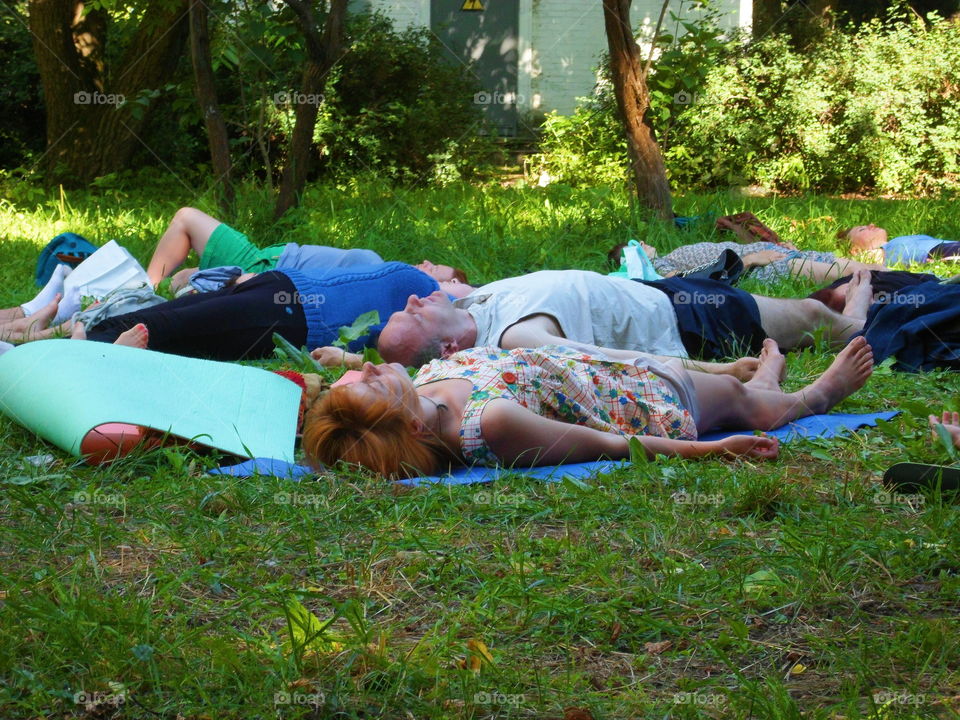 group of people doing yoga outdoors, Ukraine, Kiev