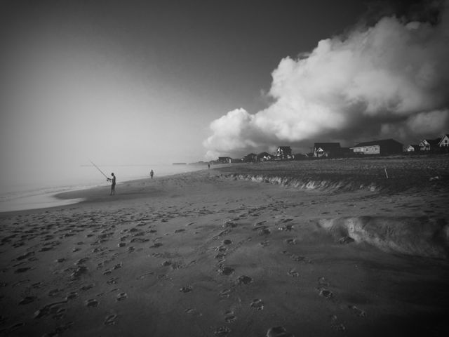 Foggy morning walk on the beach