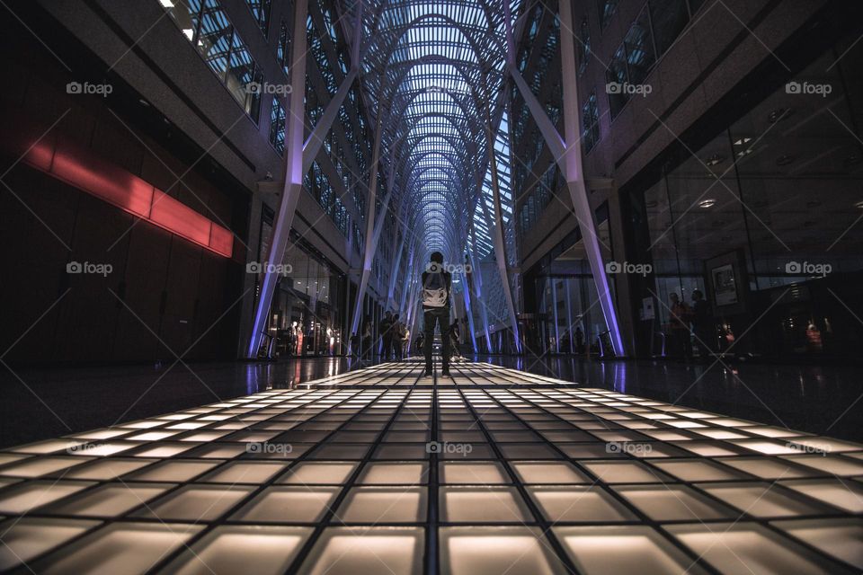 man stands on lit floor,please vote and comment,,thank you all