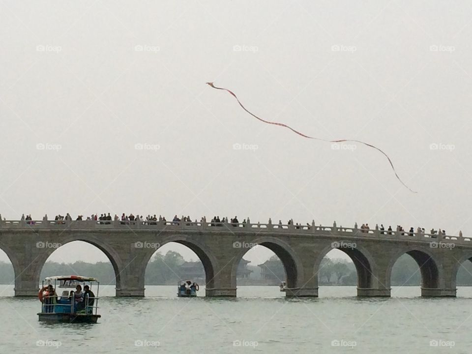 Kite flying over a bridge #ChineseTradition #SummerPalace