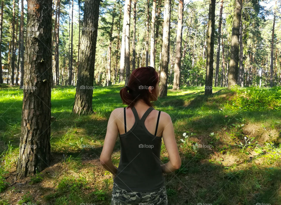 female figure in the forest, summertime, traveling, camping, teenage girl