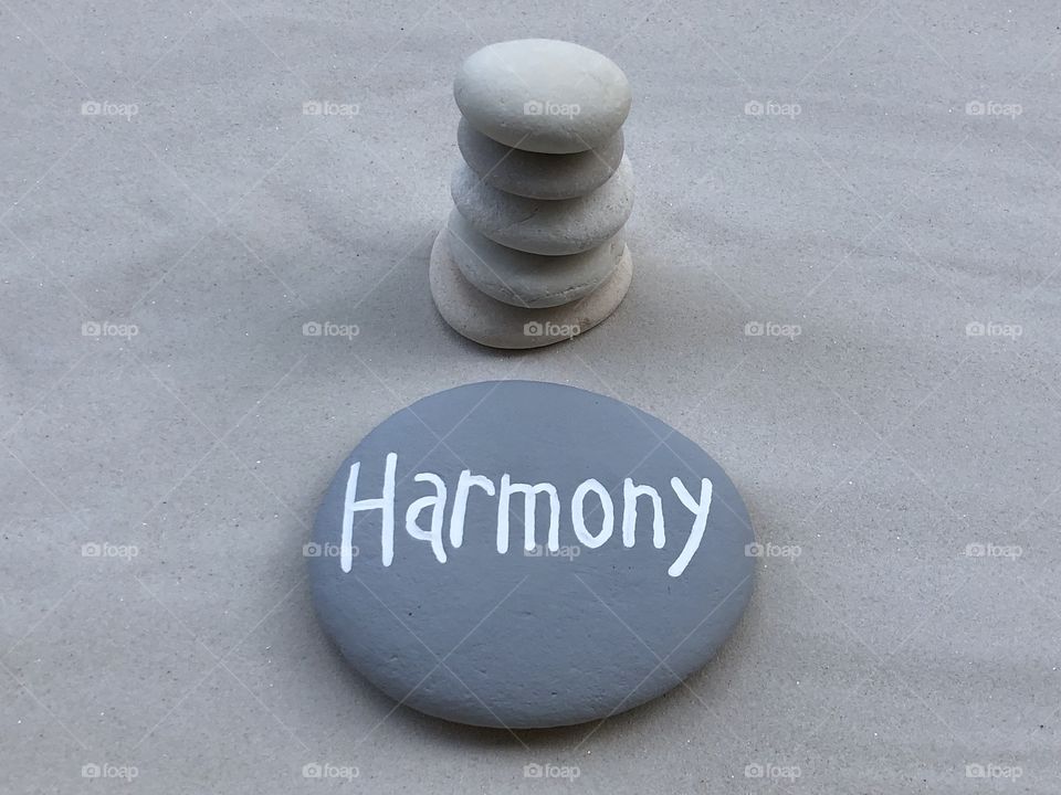 Harmony stones over white sand