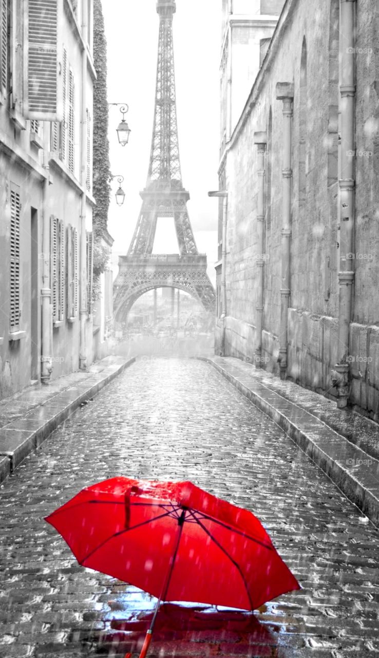 so beautiful photo nice black & white image and colourful red umbrella it's a parish.