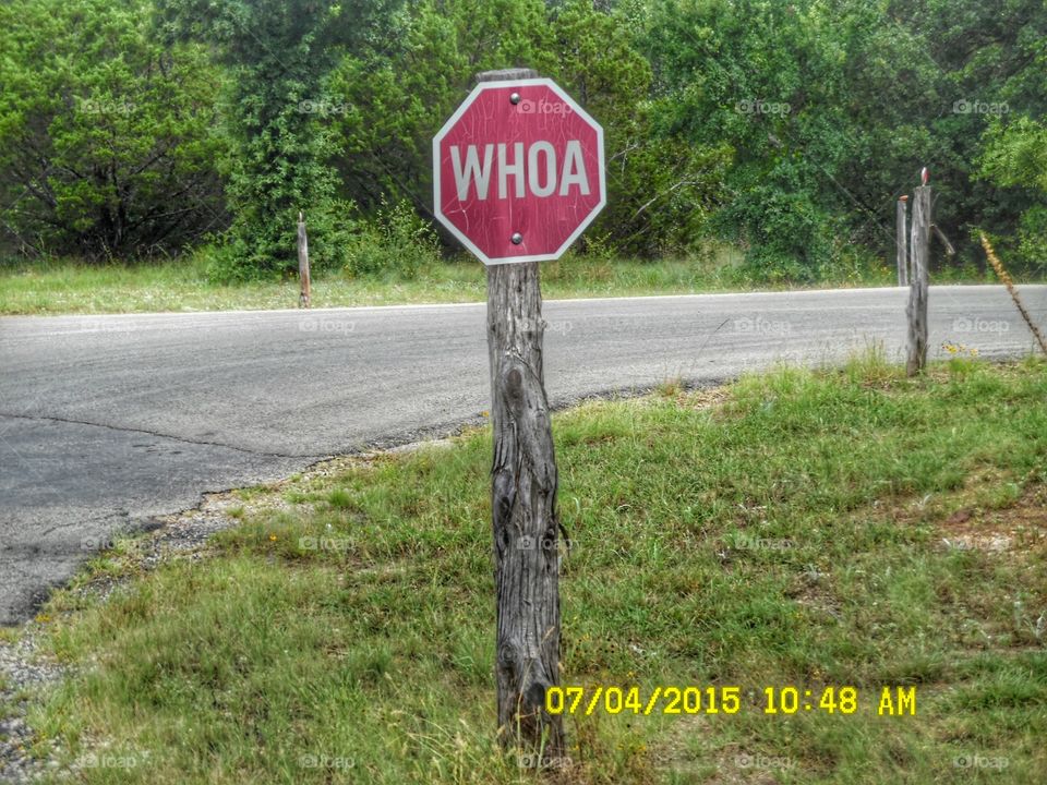 Texas brand of stop ✋ sign. This is a sign that I saw while out walking 🚶 🏃 🔥 💨 in Graham Texas.