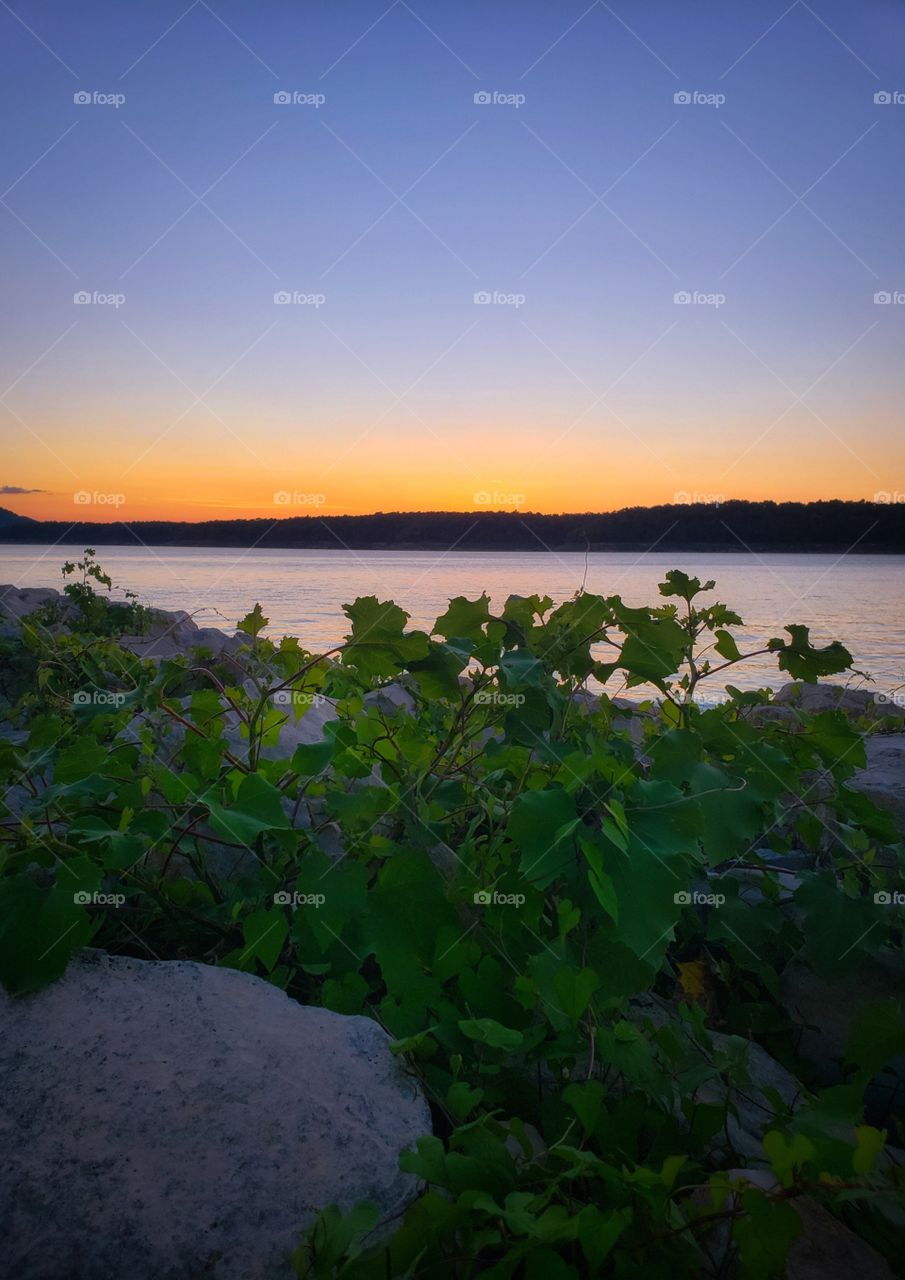 The golden Hour arrives again at Bull Shoals Lake in Northern Arkansas showing off its true beauty. 