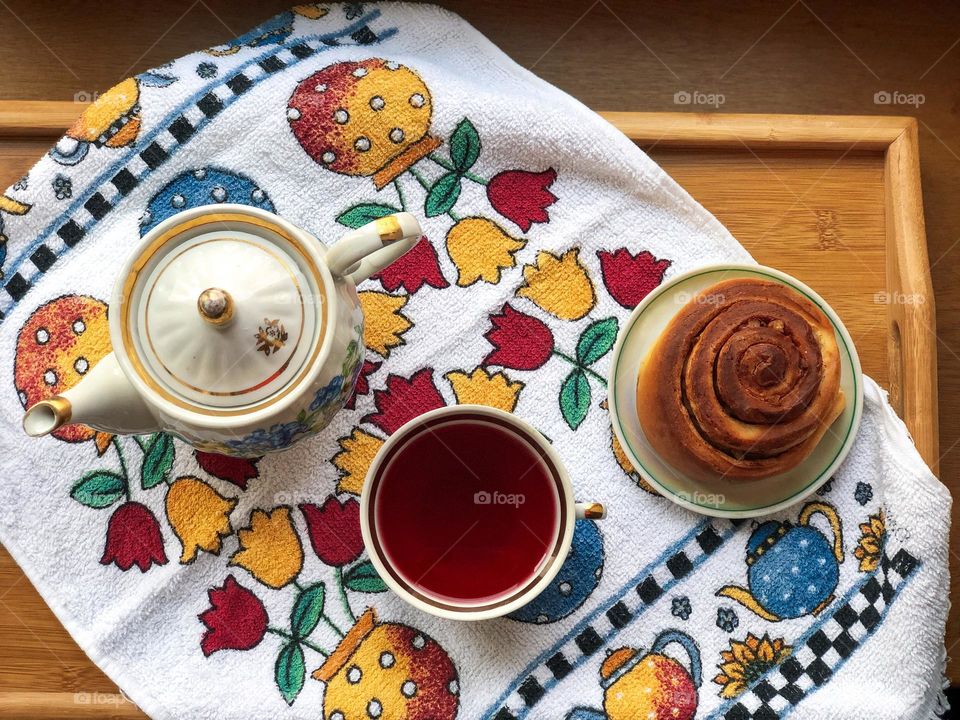 Tea time with cinnamon bun