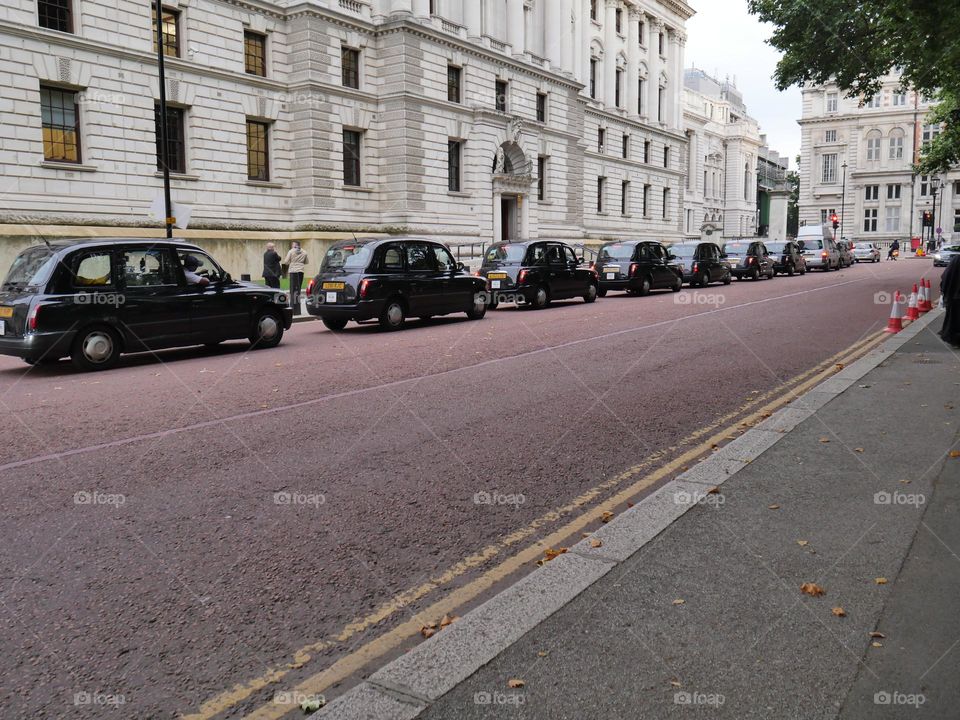 Queue of black cabs, London
