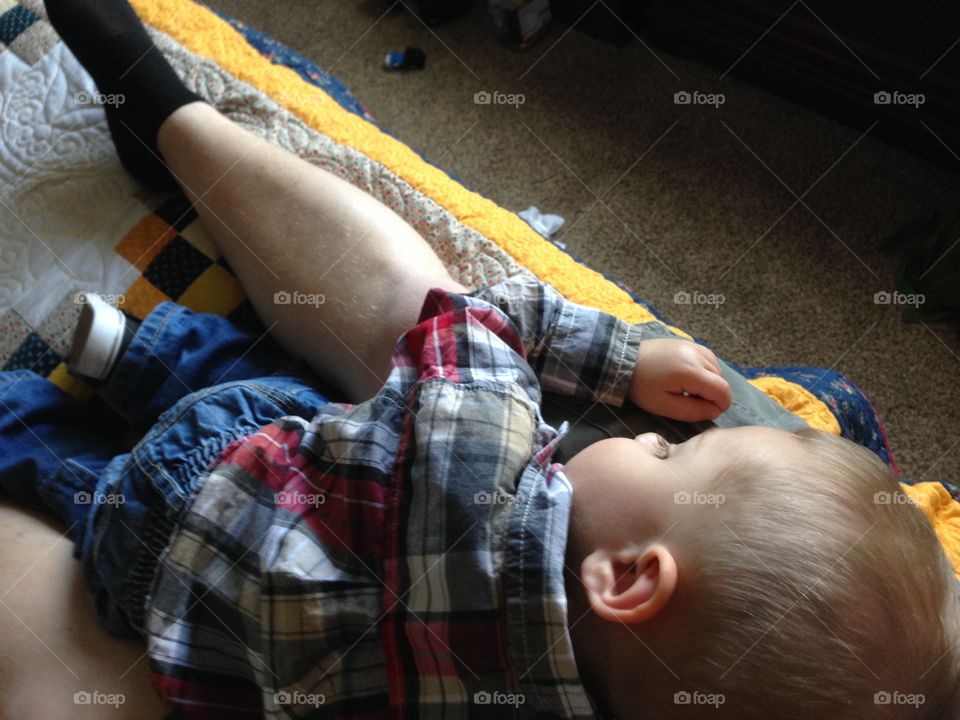 My son watching TV, doesn't look very comfortable, but what do I know?