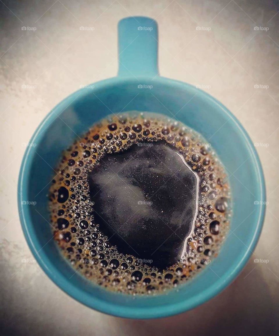 Steaming Coffee in a Blue Mug