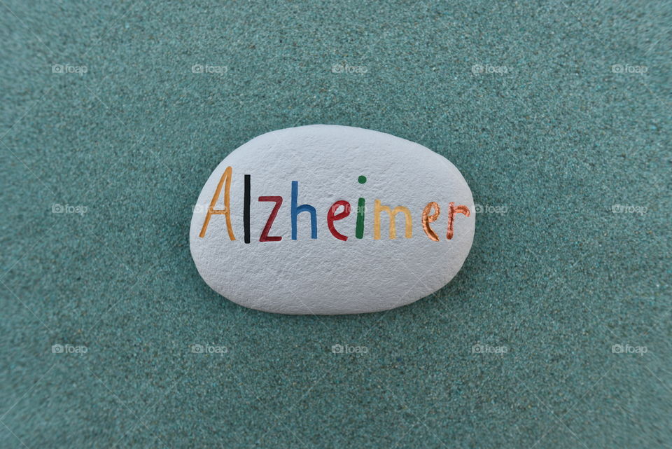 Alzheimer disease name painted on a stone