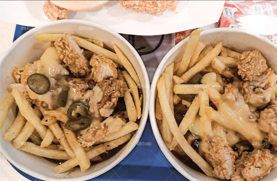 "Loaded Fries with Fried Chicken and Jalapenos"