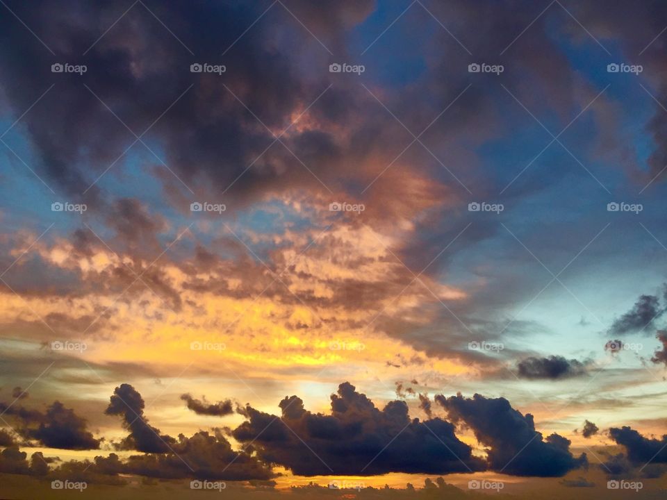 Moody Sky. Dramatic sky at sunrise, Riviera Maya, Mexico 