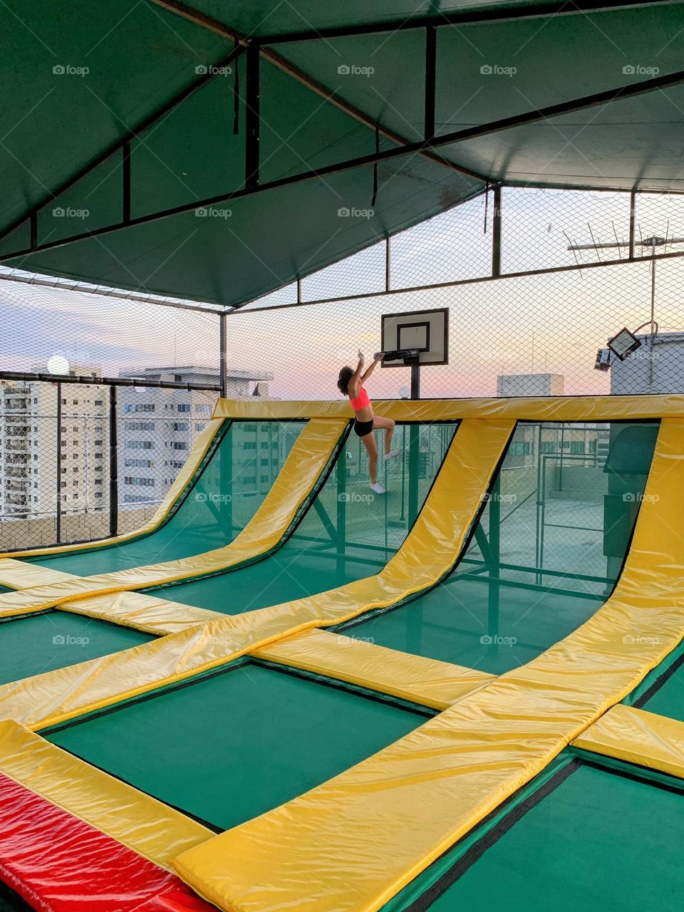 Child jumping on trampoline