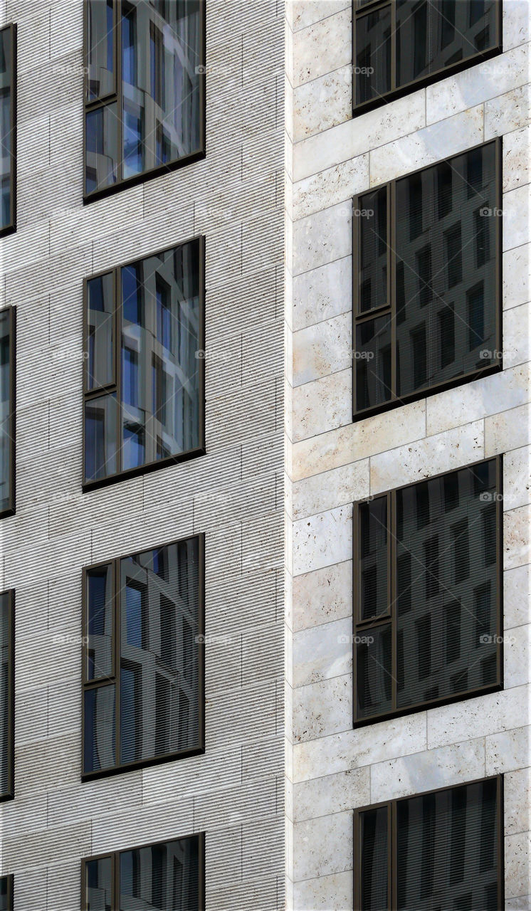 Full frame shot of windows reflecting the building on the other side in Berlin, Germany.