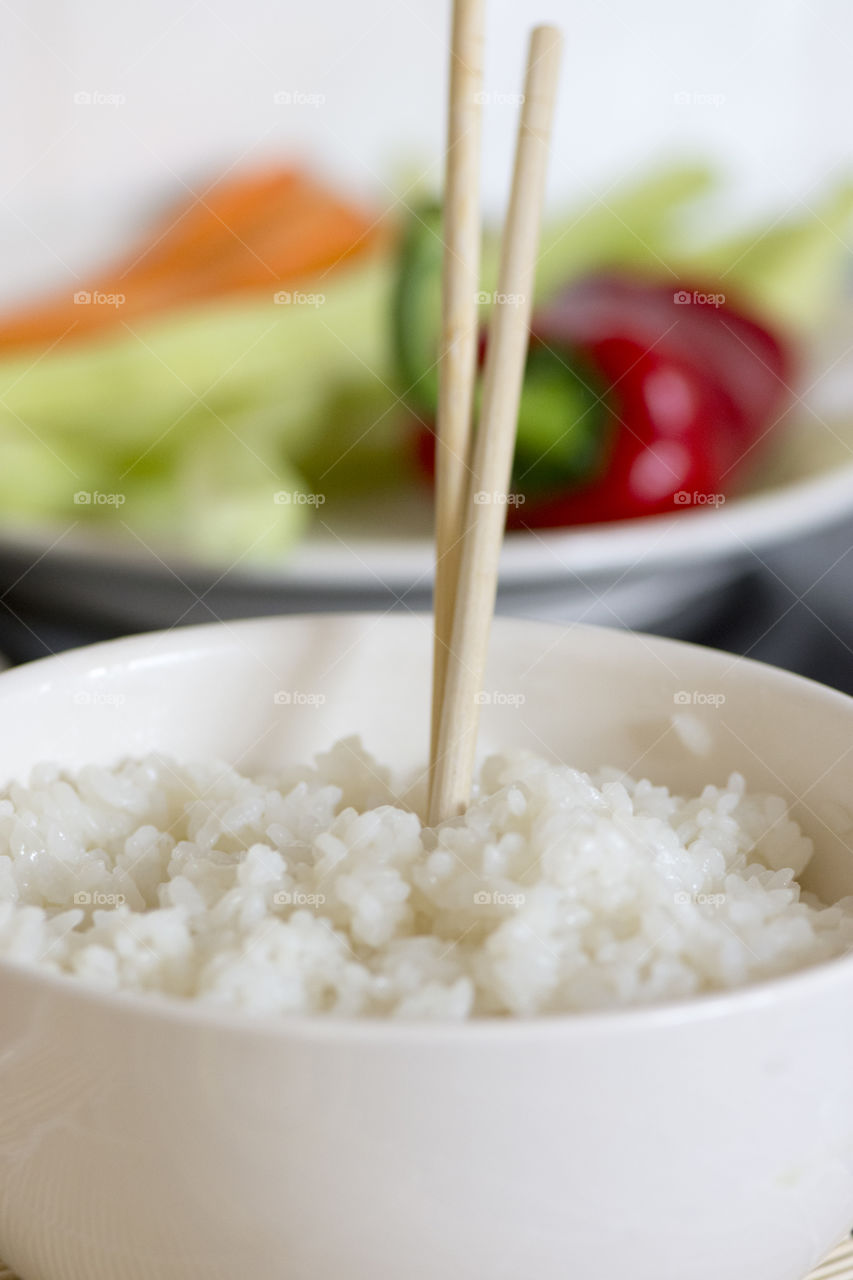 Close-up of rice with chopstick
