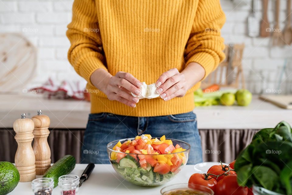 woman making salad