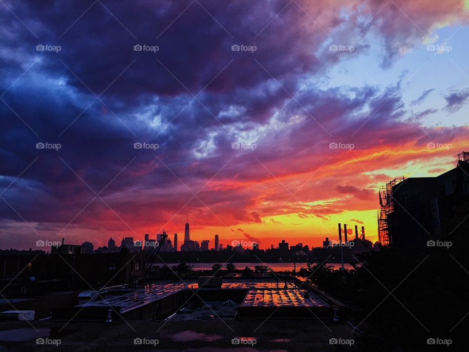 Stormy clouds above big city