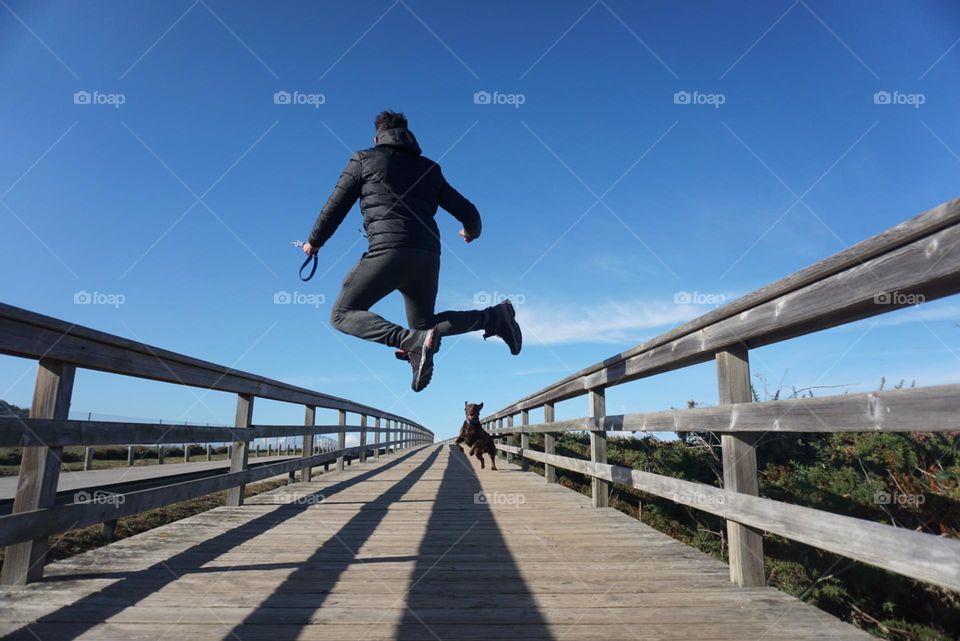 Jump#human#dog#walk#fun#sky