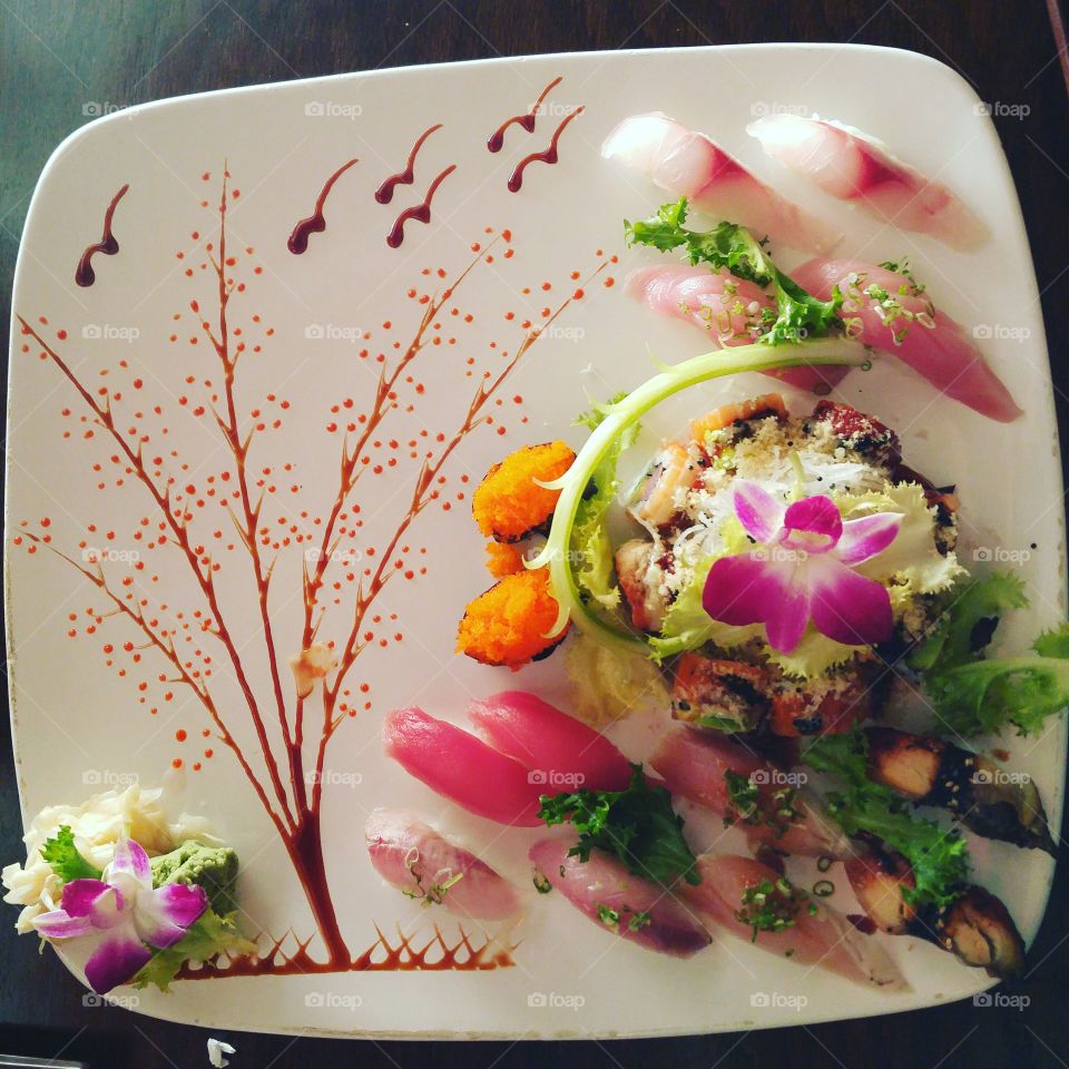 Beautiful decorated plate of sushi