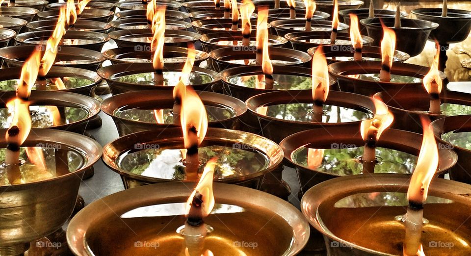 Oil lamps in row