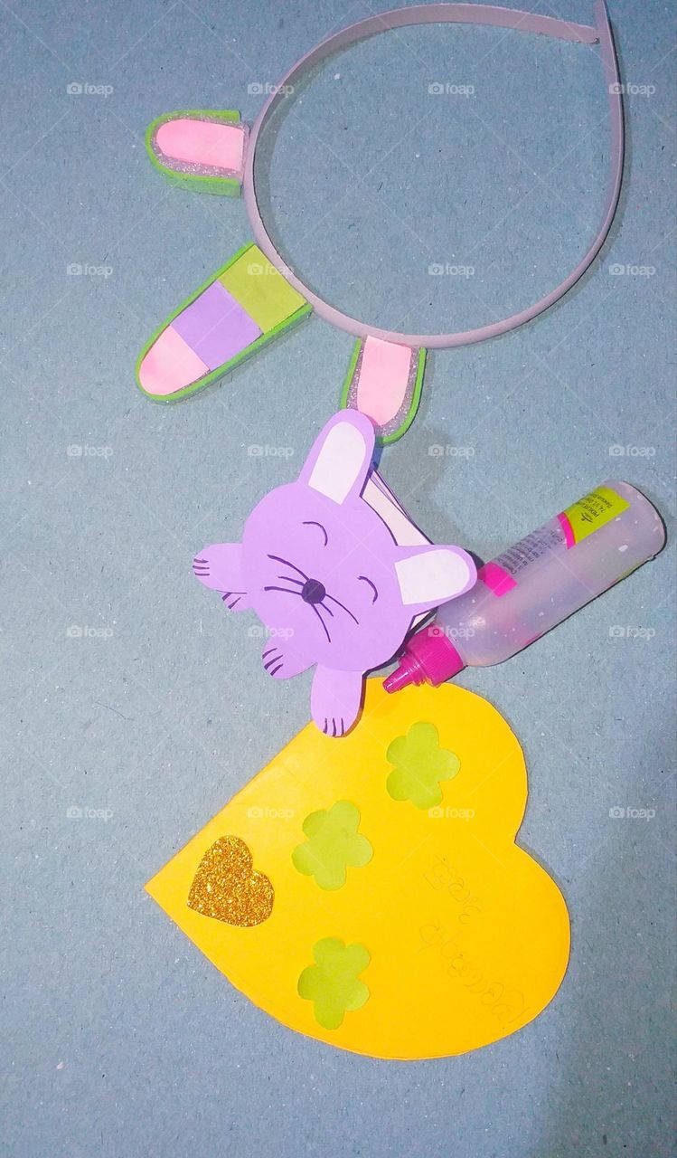 Paper crafts for children - hair band, cat, invitation card, and bottle of gum