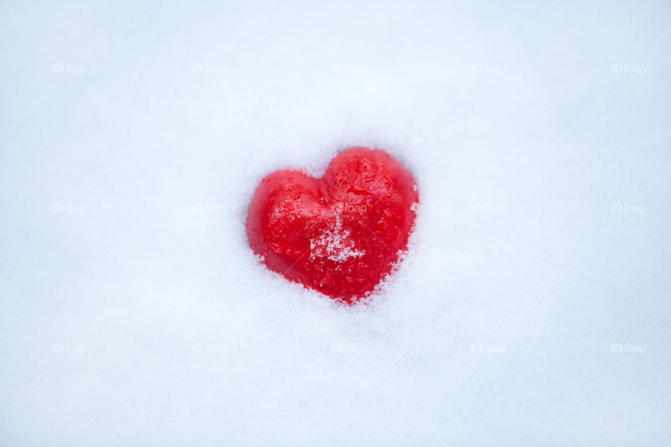 Heart shape food on snow