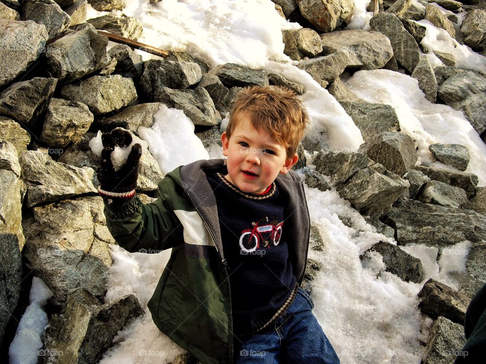 Cute boy enjoying in winter